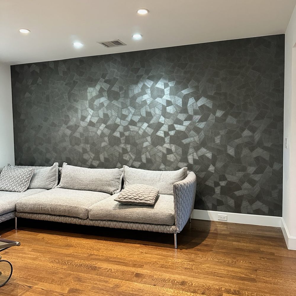 Bedroom with dark patterned wallpaper